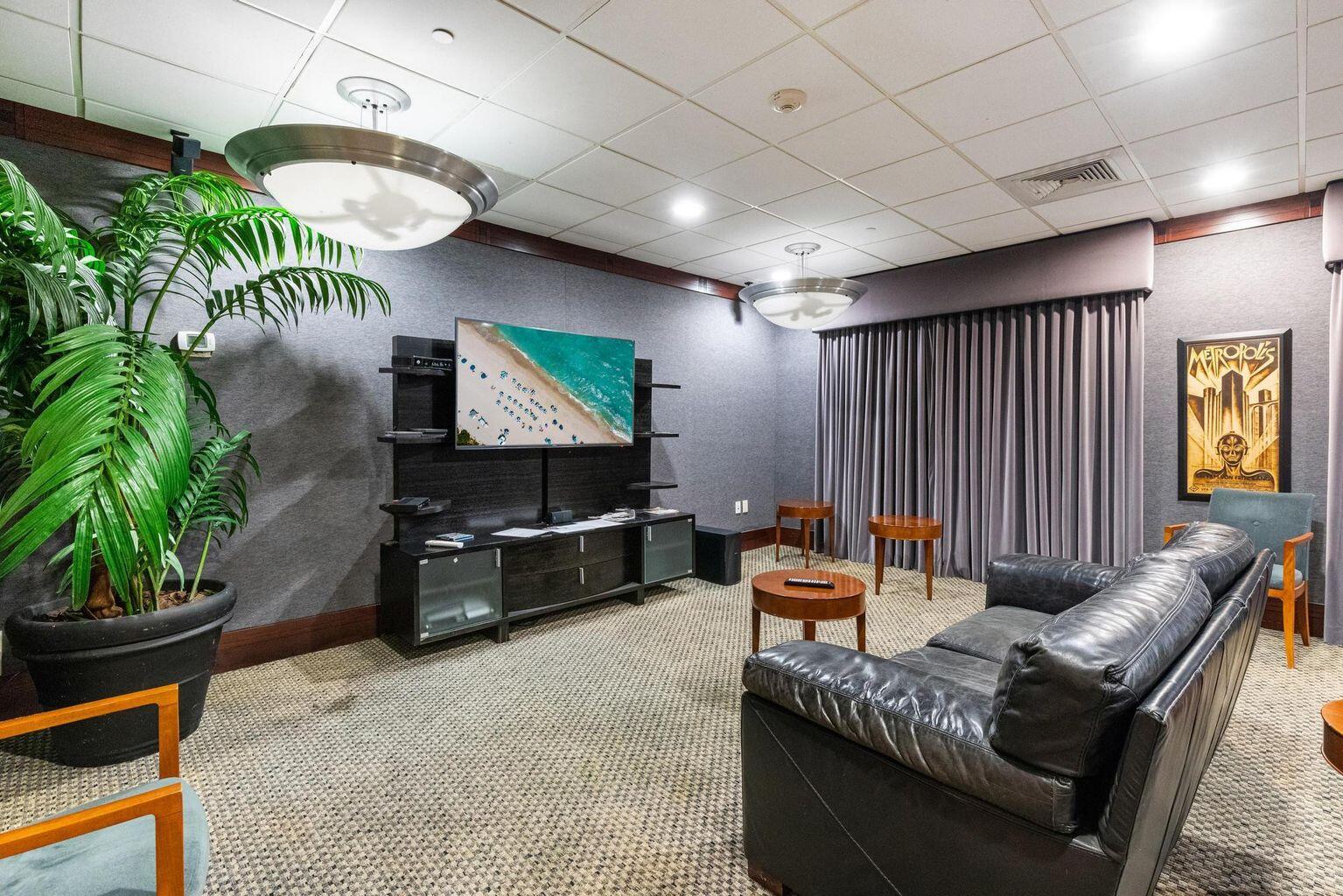 1900 South Ocean Boulevard, Unit 11B Lauderdale-by-the-Sea, FL 33062 - Photo 18 of 19 a reading room with furniture and a potted plant