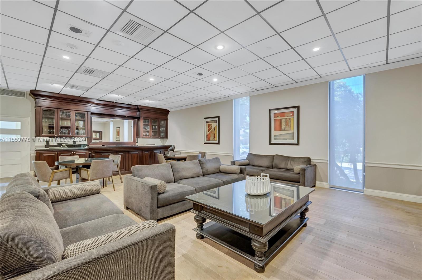 1900 South Ocean Boulevard, Unit 11B Lauderdale-by-the-Sea, FL 33062 - Photo 19 of 19 a living room with furniture