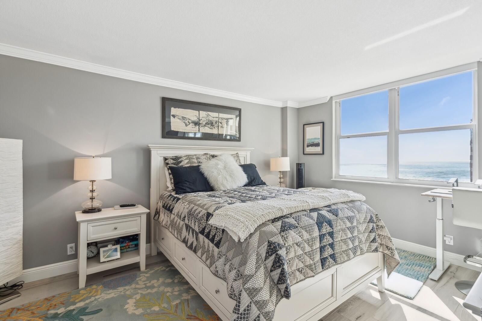 1900 South Ocean Boulevard, Unit 11B Lauderdale-by-the-Sea, FL 33062 - Photo 3 of 19 a bedroom with a bed and window