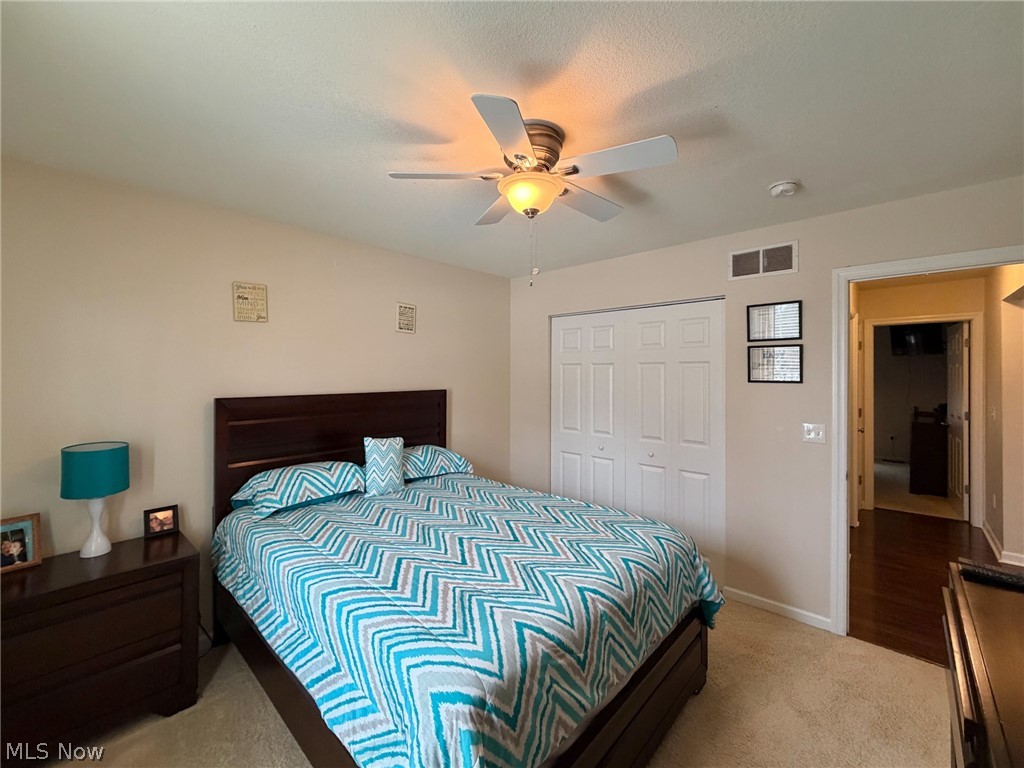 1343 Courtland Road Weirton, WV 26062 - Photo 31 of 50 Bedroom featuring light colored carpet, a closet, and ceiling fan