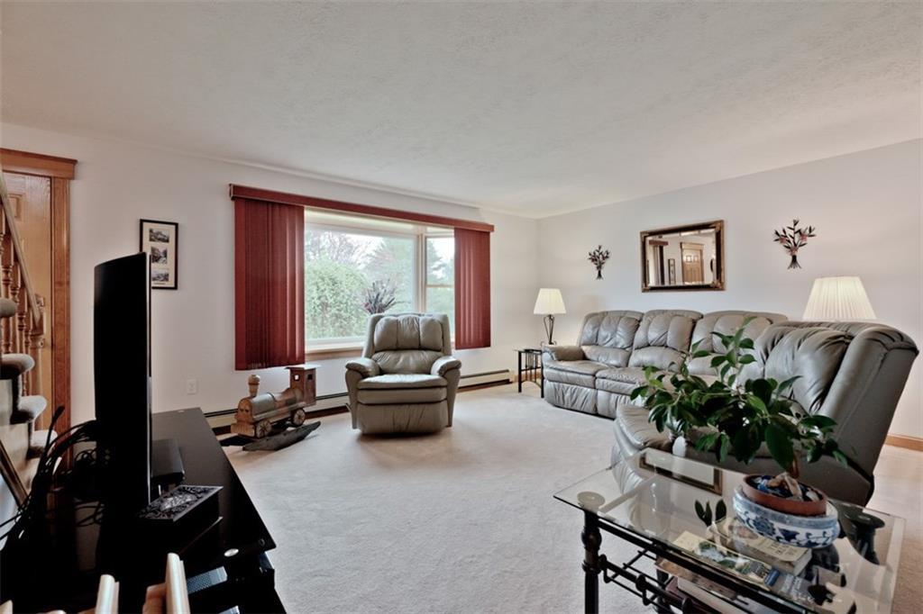 39 Depot Street Windham, ME 04062 - Photo 13 of 34 Living room is located just off from...