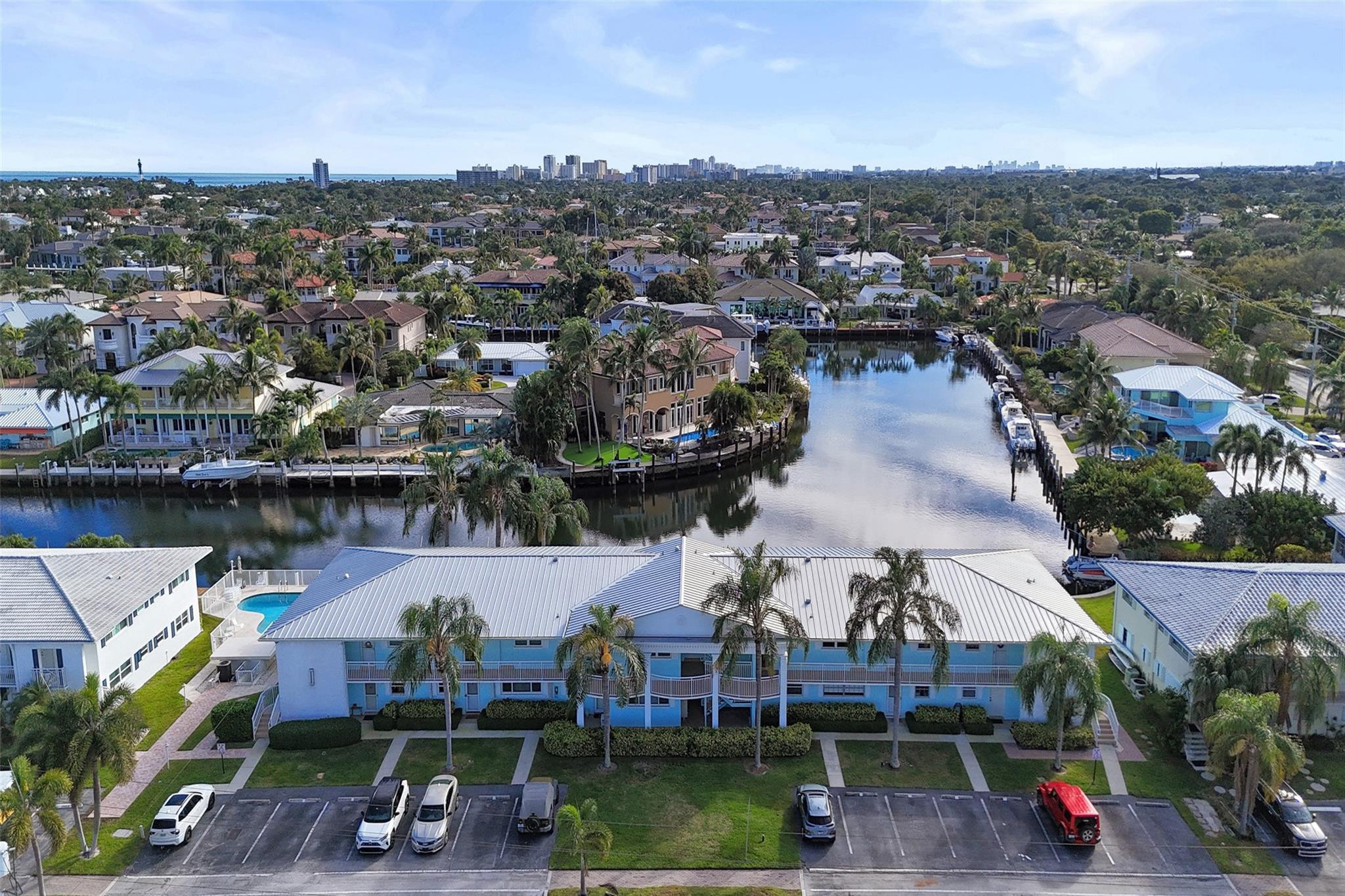 an aerial view of a house with a ocean view