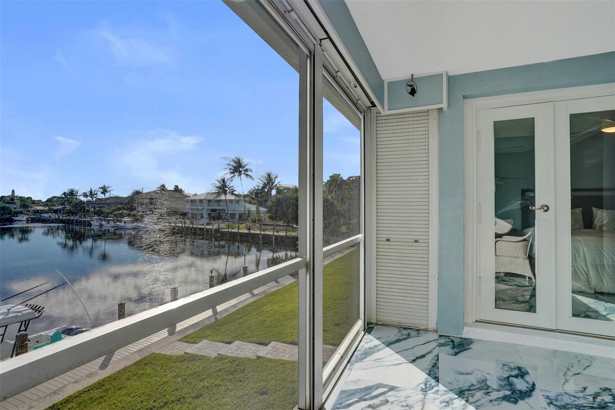 2330 Northeast 36th Street, Unit 9 Lighthouse Point, FL 33064 - Photo 25 of 48 a balcony with view of lake