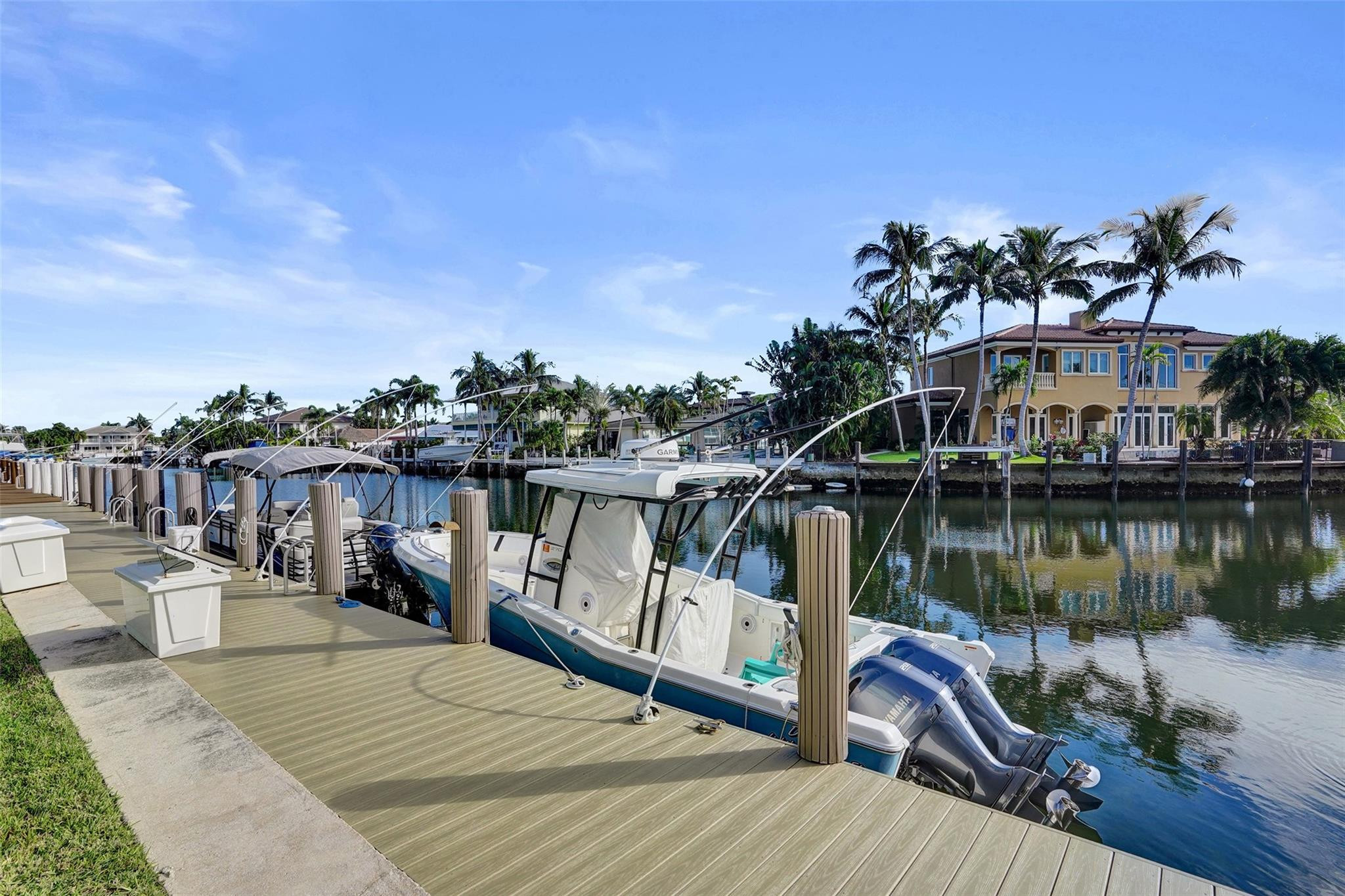 2330 Northeast 36th Street, Unit 9 Lighthouse Point, FL 33064 - Photo 4 of 48 a view of a house with a lake view