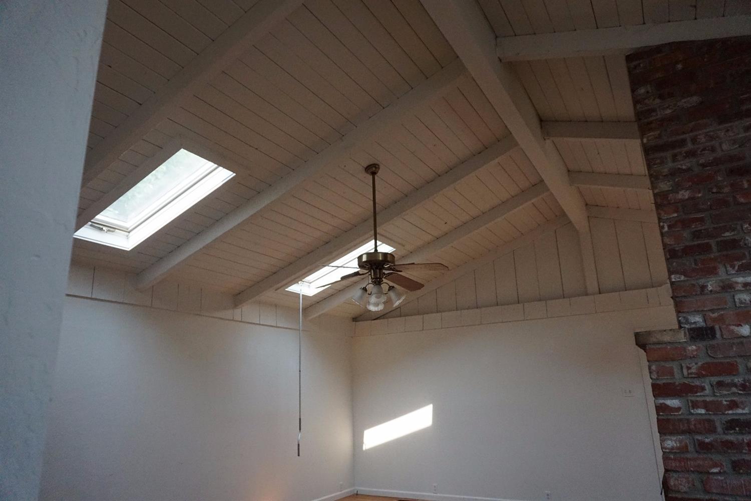 1312 Talent Avenue Talent, OR 97540 - Photo 5 of 21 a view of a livingroom with a ceiling fan and window