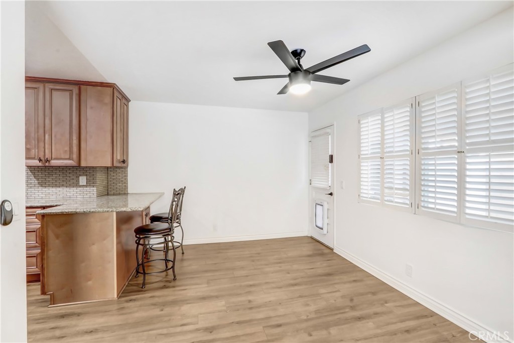 1277 West 14th Street Upland, CA 91786 - Photo 4 of 11 a view of a workspace with furniture and a window