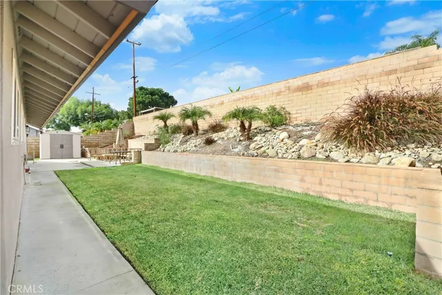 a view of yard with outdoor seating