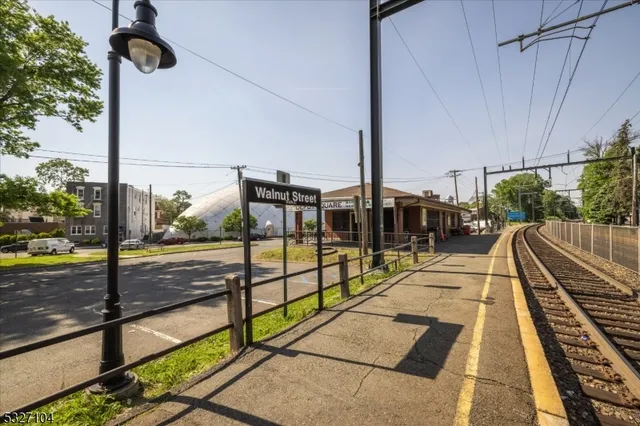 a view of balcony with wooden floor