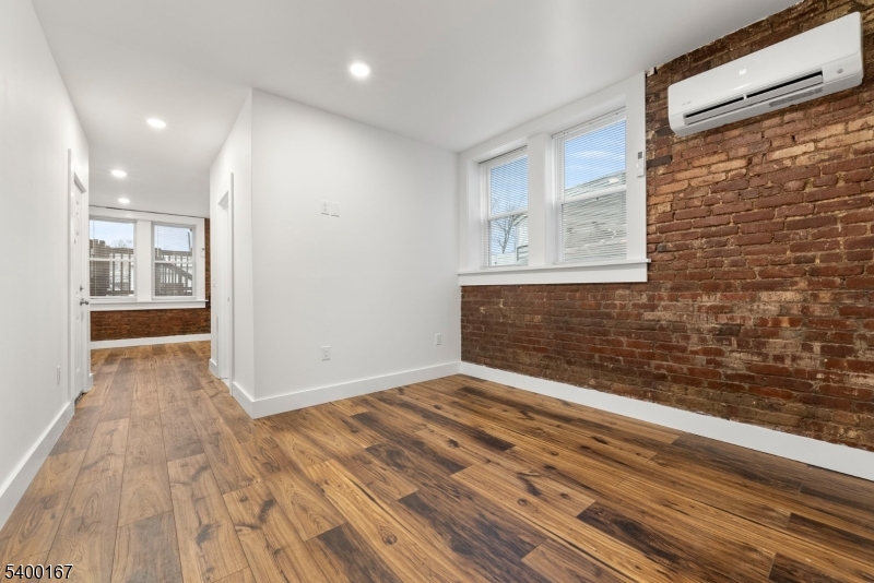 200 Forest Street, Unit R Montclair, NJ 07042 - Photo 5 of 13 a view of an empty room and glass door