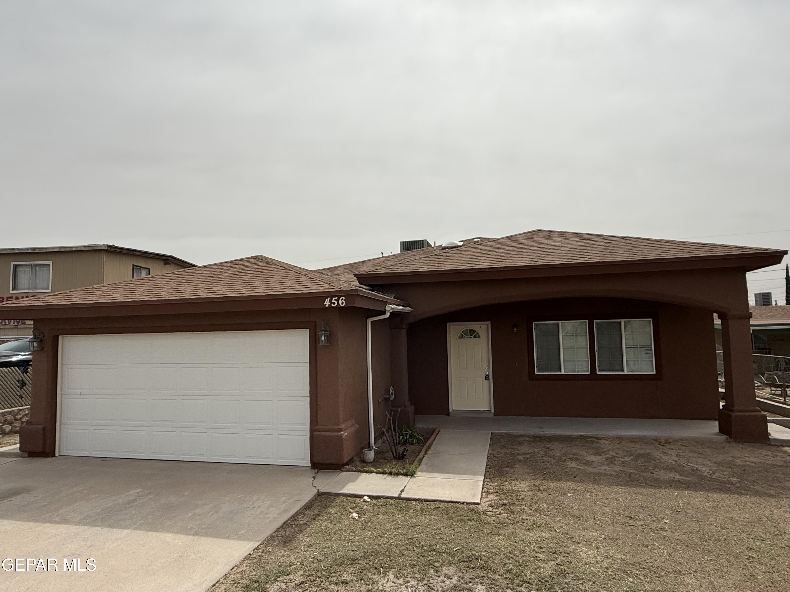456 Passmore Road Socorro, TX 79927 - Photo 1 of 23 a front view of a house