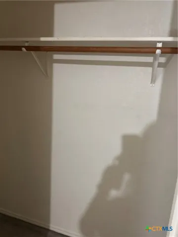 a view of a swimming pool with a big yard