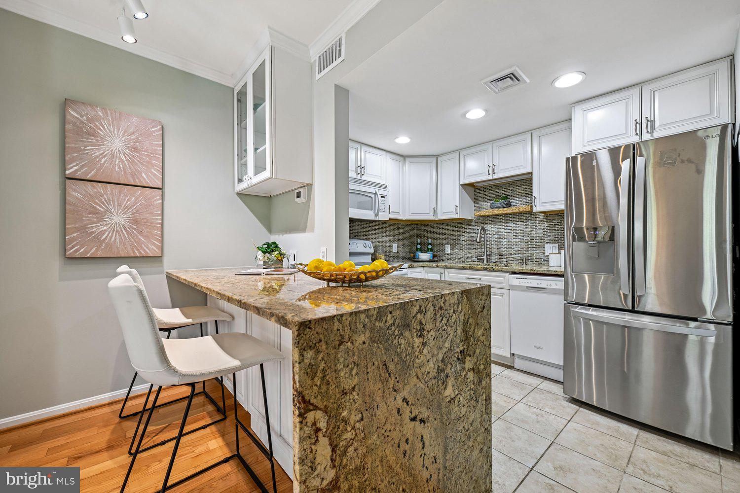 1953 Calvert Street Northwest, Unit D Washington, DC 20009 - Photo 12 of 36 Kitchen Open to Living Room