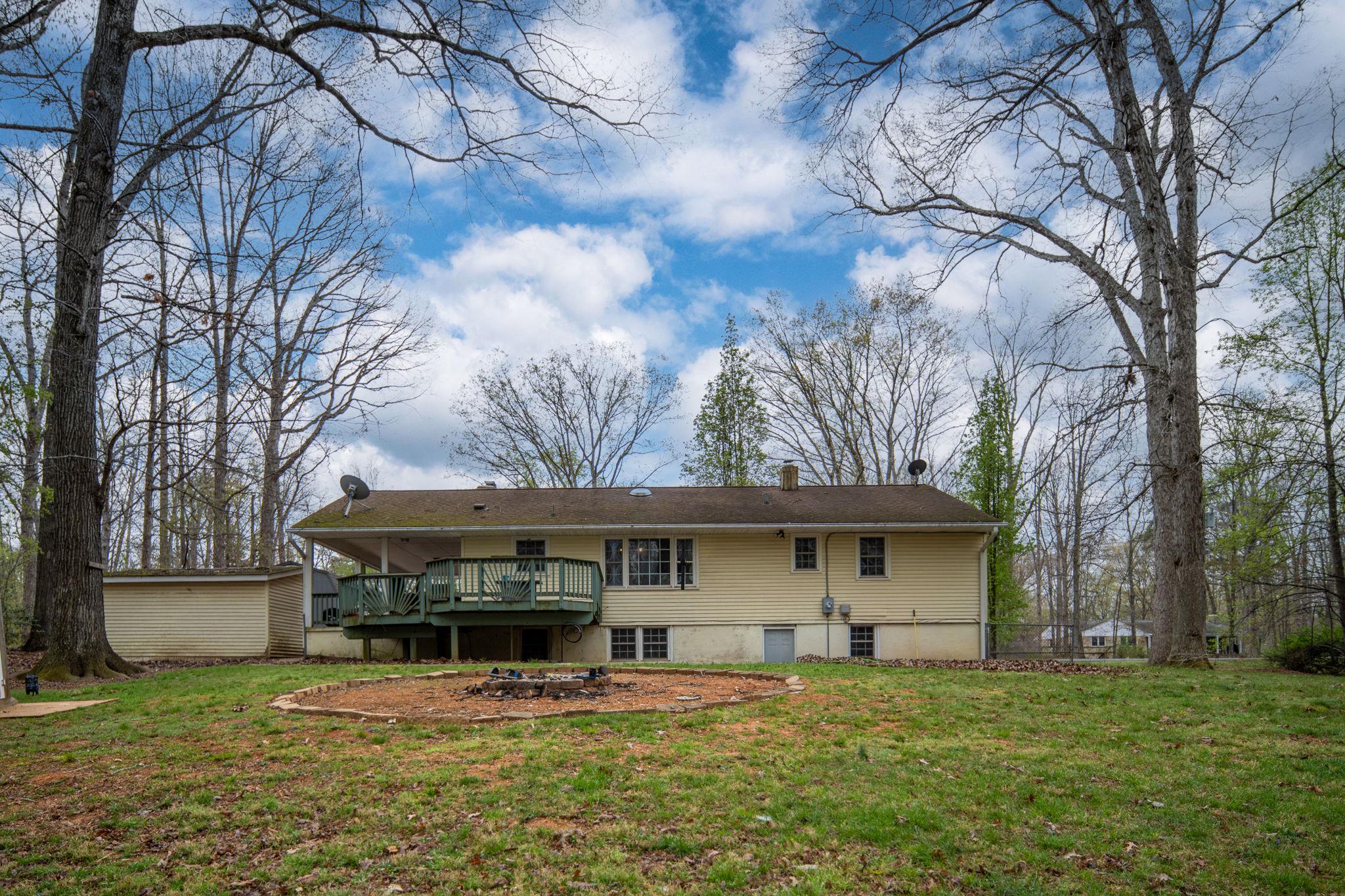 Large Deck. treed rear yard