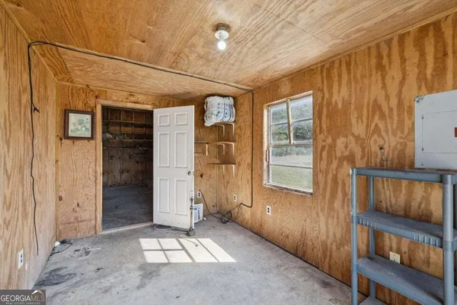a view of a porch with wooden floor