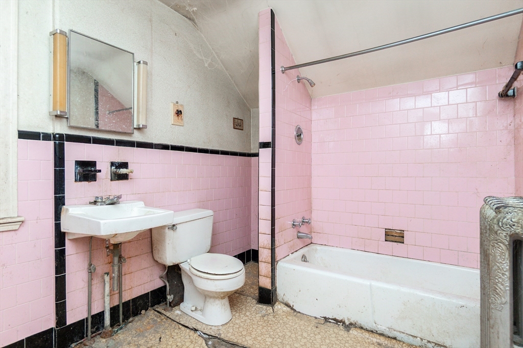 270 Garden Street Fall River, MA 02720 - Photo 15 of 36 a bathroom with a sink a toilet and shower