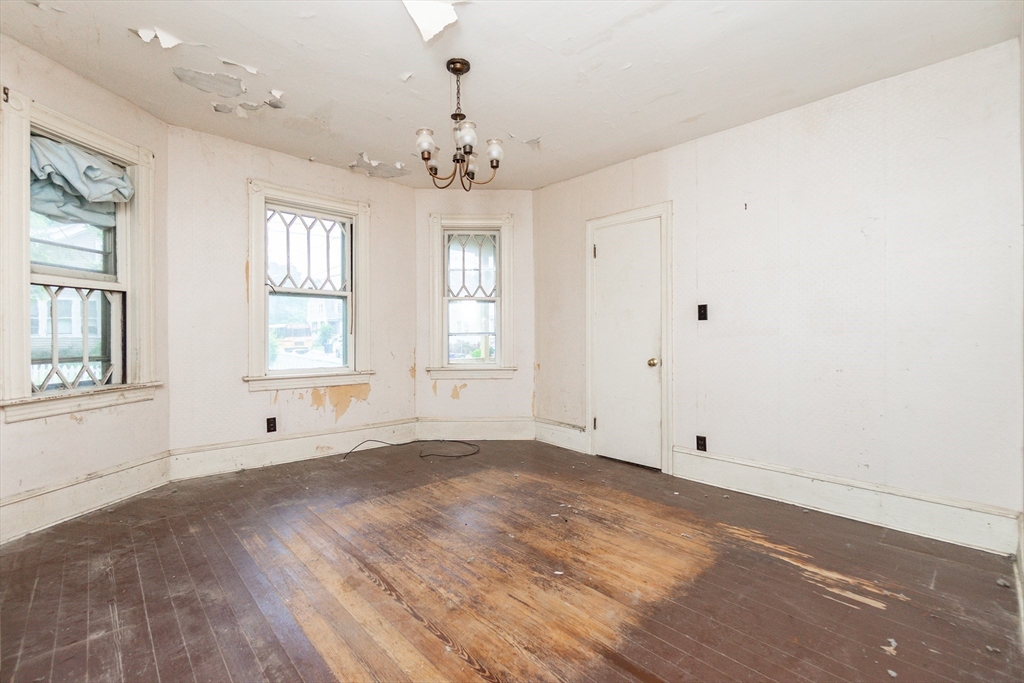 270 Garden Street Fall River, MA 02720 - Photo 2 of 36 wooden floor in an empty room with a window