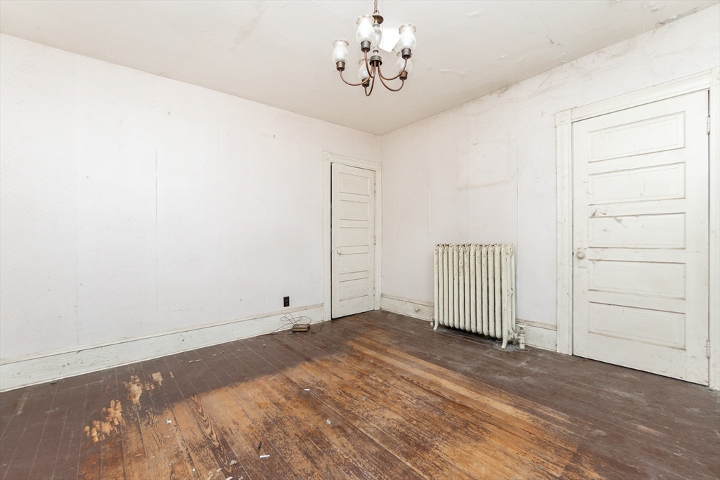 270 Garden Street Fall River, MA 02720 - Photo 22 of 36 an empty room with a mirror