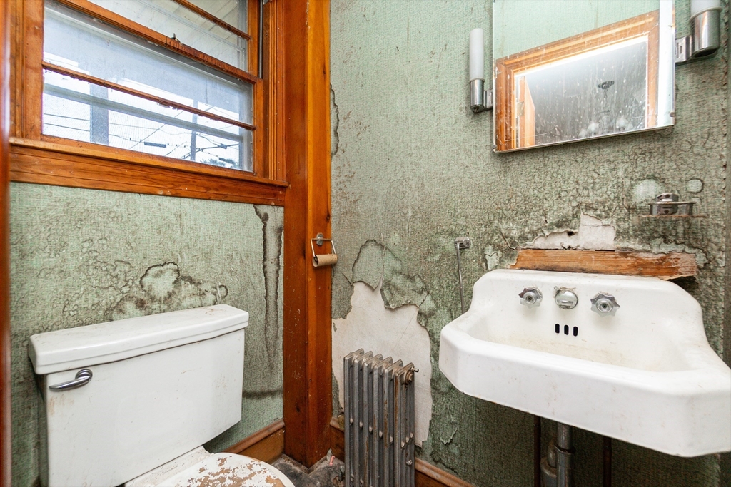 270 Garden Street Fall River, MA 02720 - Photo 26 of 36 a bathroom with a sink a toilet and a bathtub