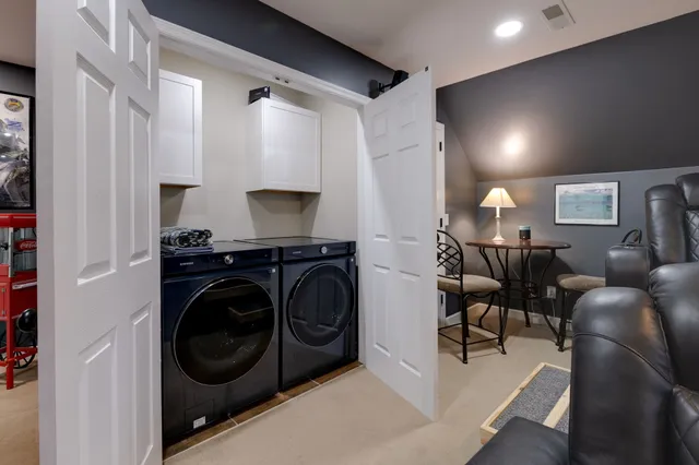 a bed room with bed and window