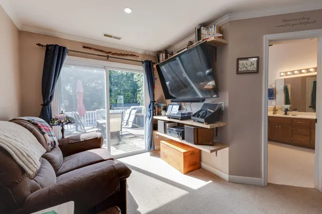 a bed room with a bed and a couch