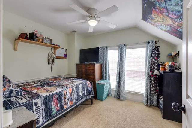 a en suite bathroom with a sink and a mirror