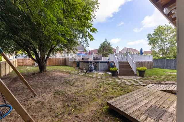 a backyard of a house with lots of green space