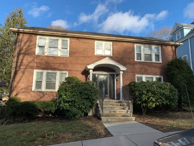 front view of house with a yard