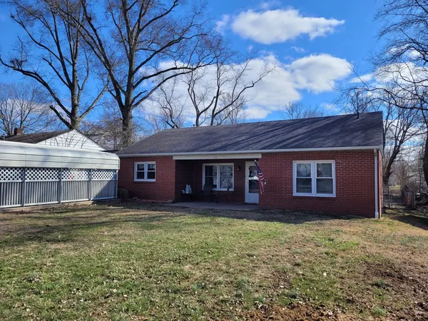 a house view with a garden space