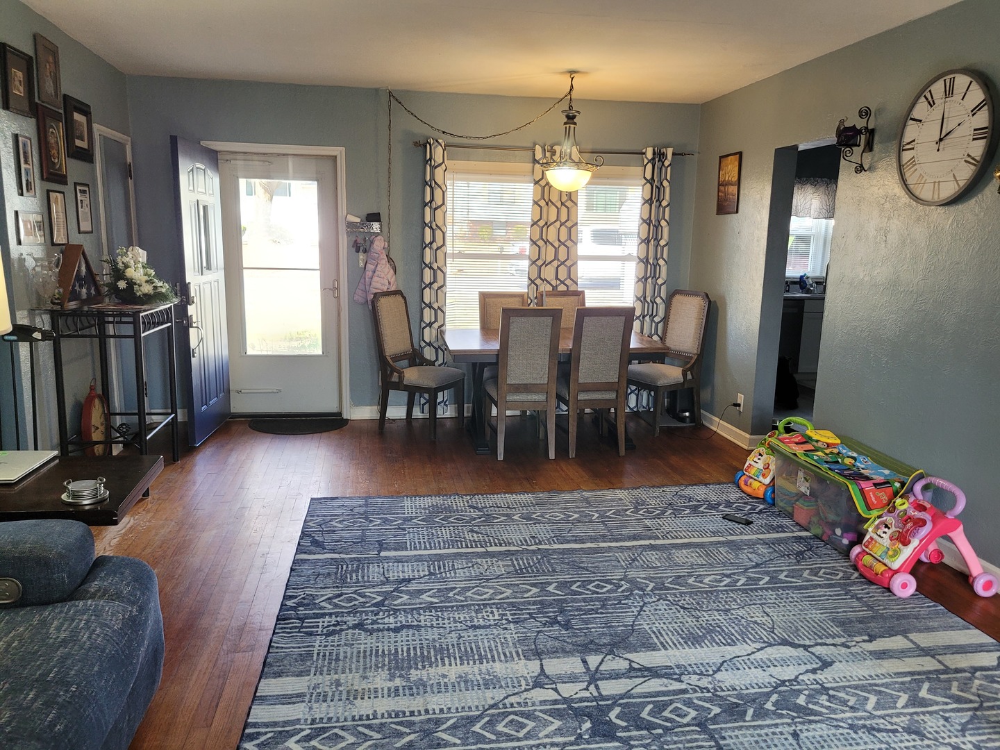 921 Airport Road Mount Vernon, IL 62864 - Photo 11 of 26 a view of a dining room with furniture window and wooden floor