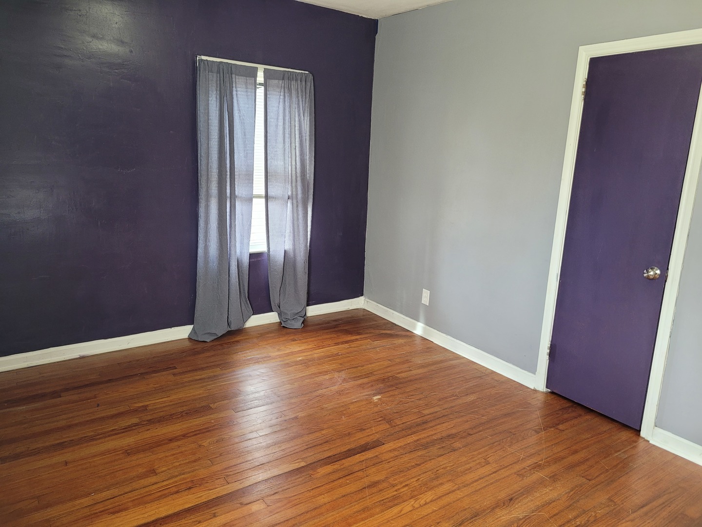 921 Airport Road Mount Vernon, IL 62864 - Photo 21 of 26 an empty room with wooden floor and windows