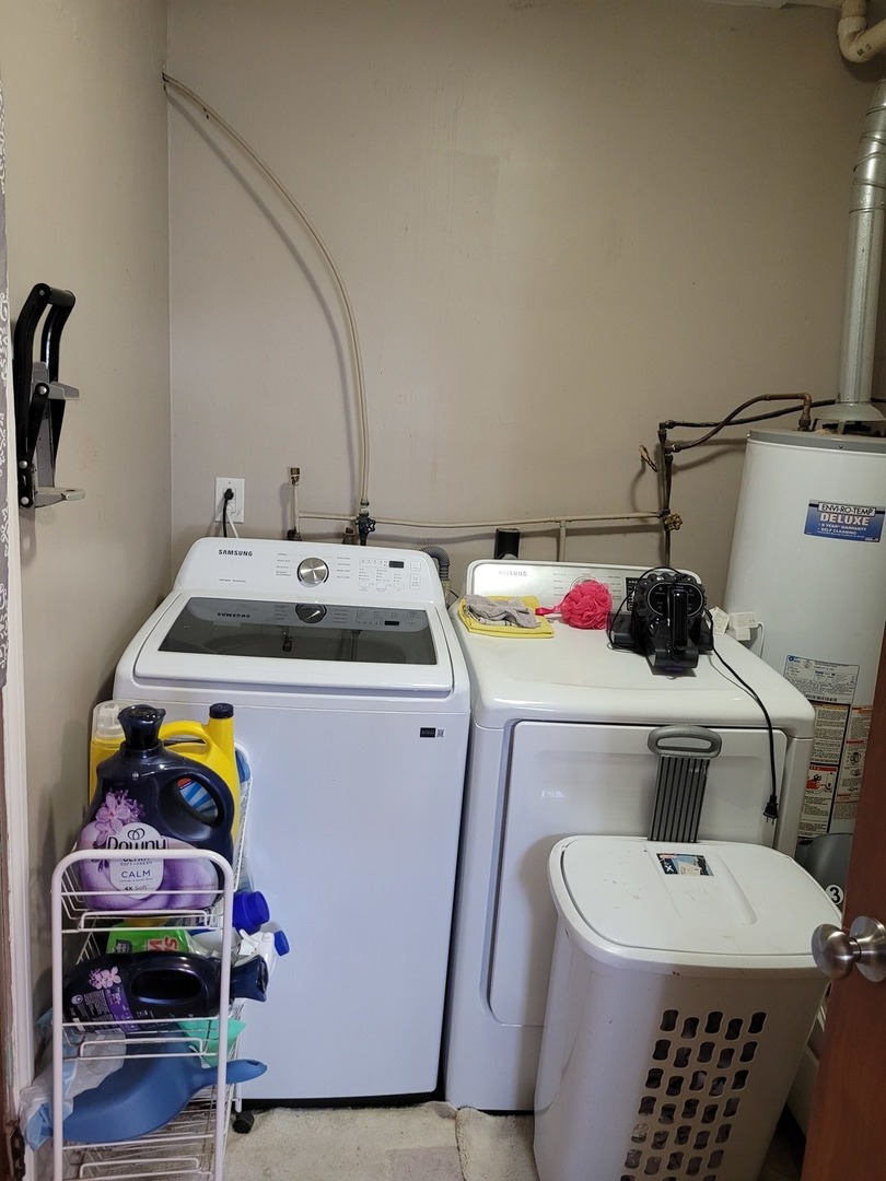 921 Airport Road Mount Vernon, IL 62864 - Photo 25 of 26 a utility room with dryer and washer