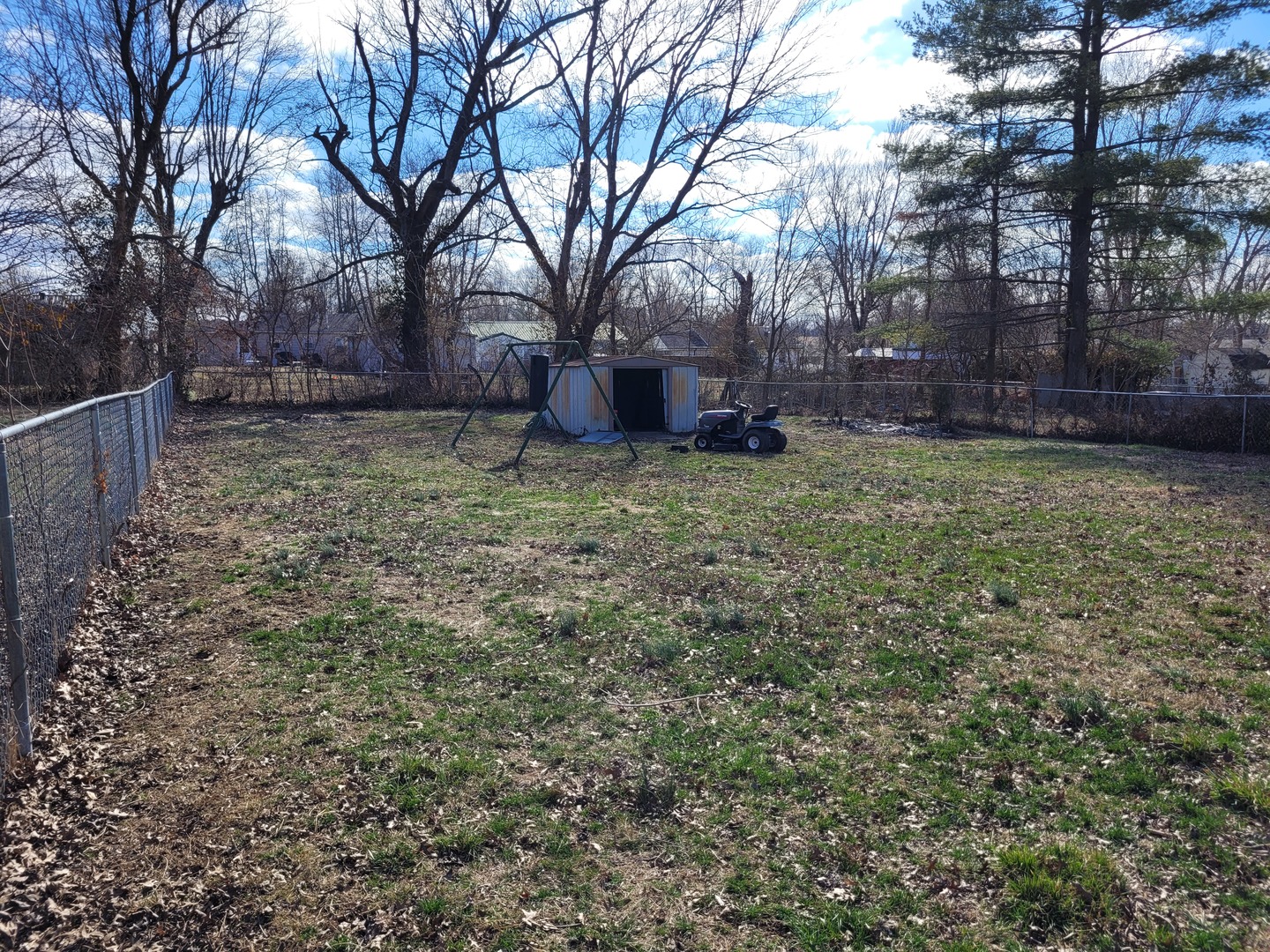 921 Airport Road Mount Vernon, IL 62864 - Photo 8 of 26 a view of a backyard with large trees