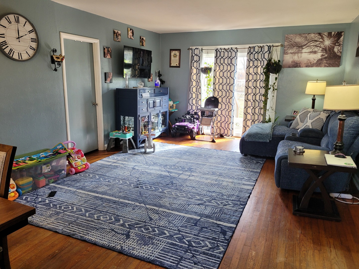 921 Airport Road Mount Vernon, IL 62864 - Photo 9 of 26 a living room with furniture and a flat screen tv
