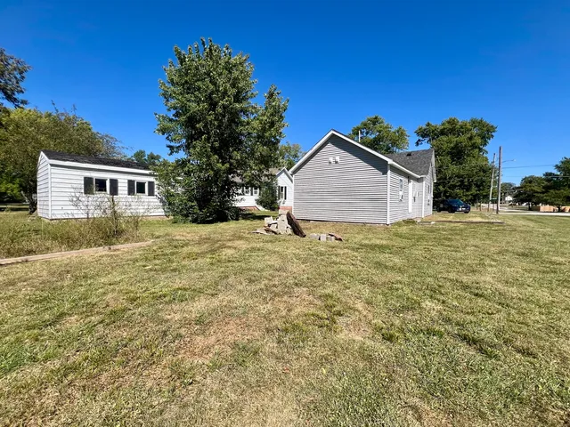 a house view with a garden space