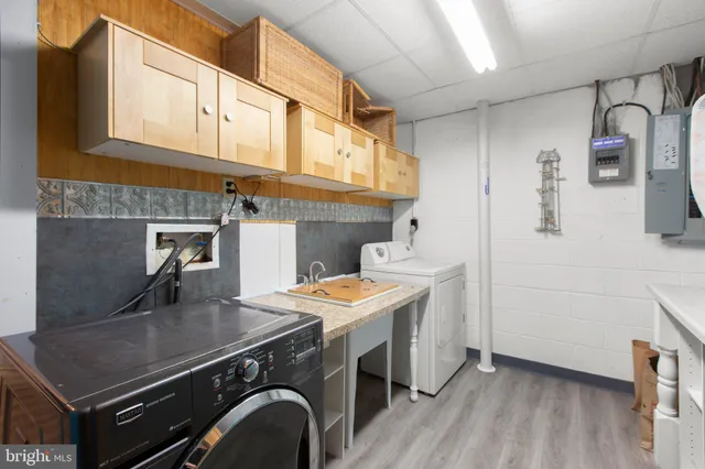 a kitchen with a stove and a refrigerator