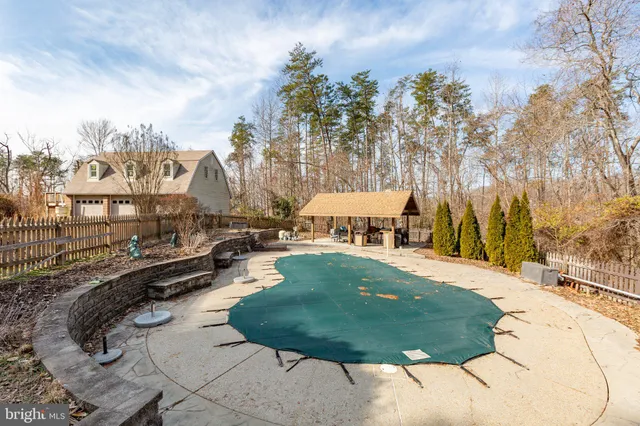 a view of outdoor space yard and swimming pool