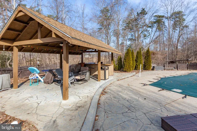 a view of a chairs and tables in patio