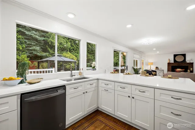 a kitchen with a sink and cabinets