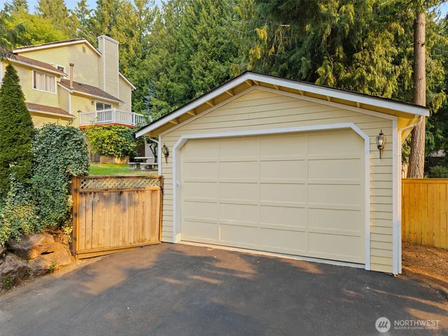 a small white house with a outdoor space