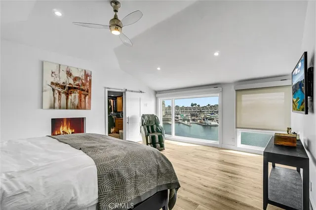 a bath tub sitting next to a bathroom sink