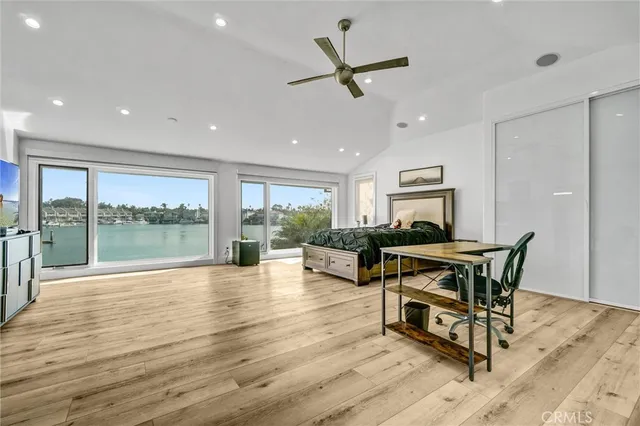a spacious bathroom with a sink a mirror and a shower