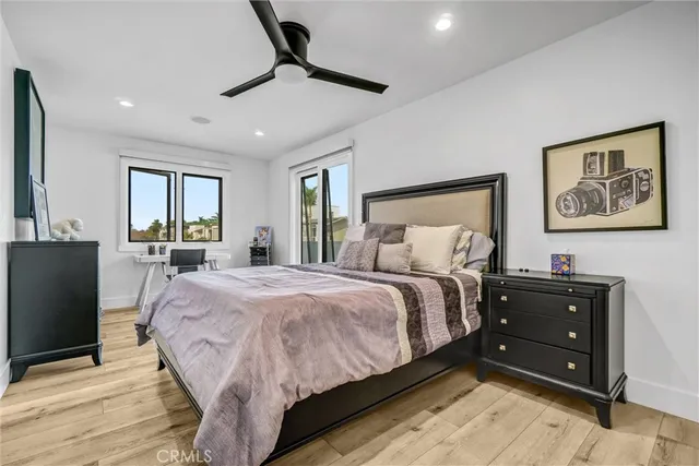 a view of a terrace with couches and city view