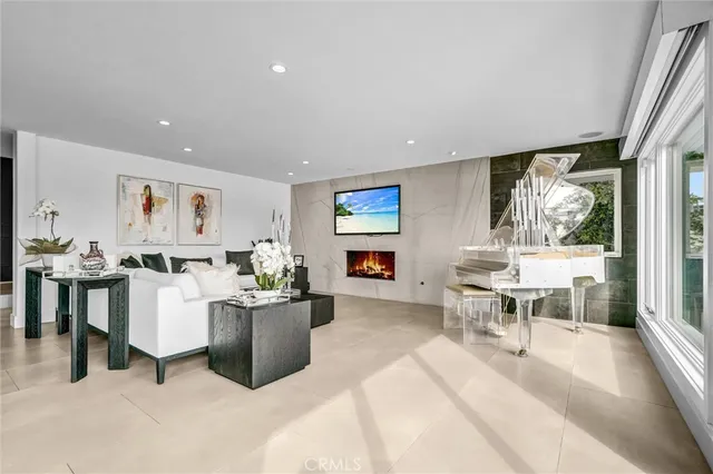 a living room with furniture and a table