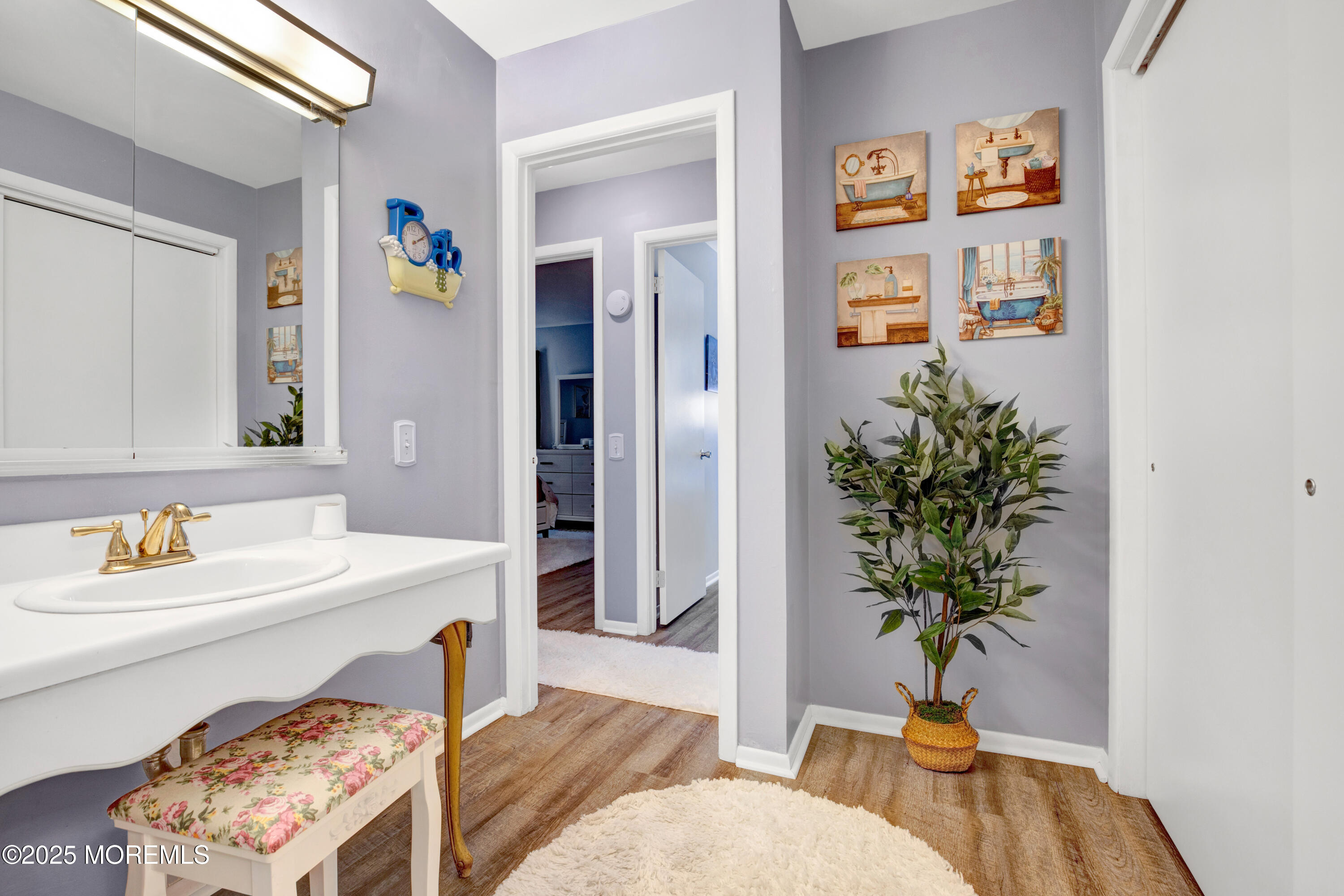 26 Salem Drive, Unit A Whiting, NJ 08759 - Photo 18 of 23 a living room with furniture and a potted plant