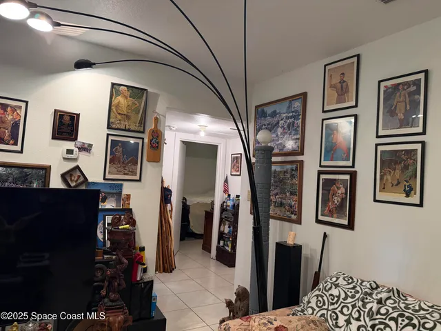 a kitchen with stainless steel appliances granite countertop a sink refrigerator and cabinets