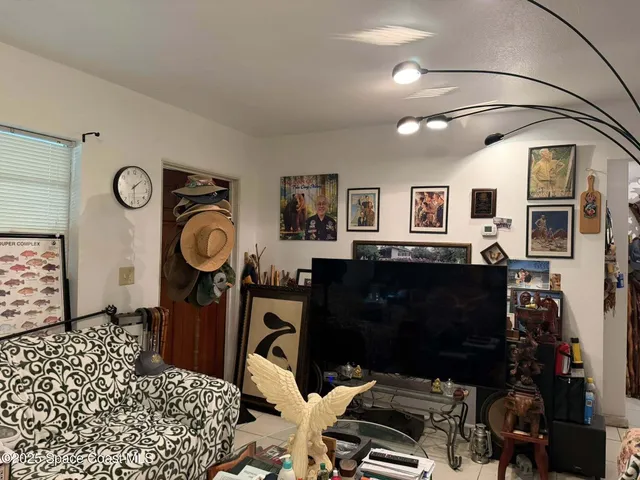 a patio with yard table and chairs