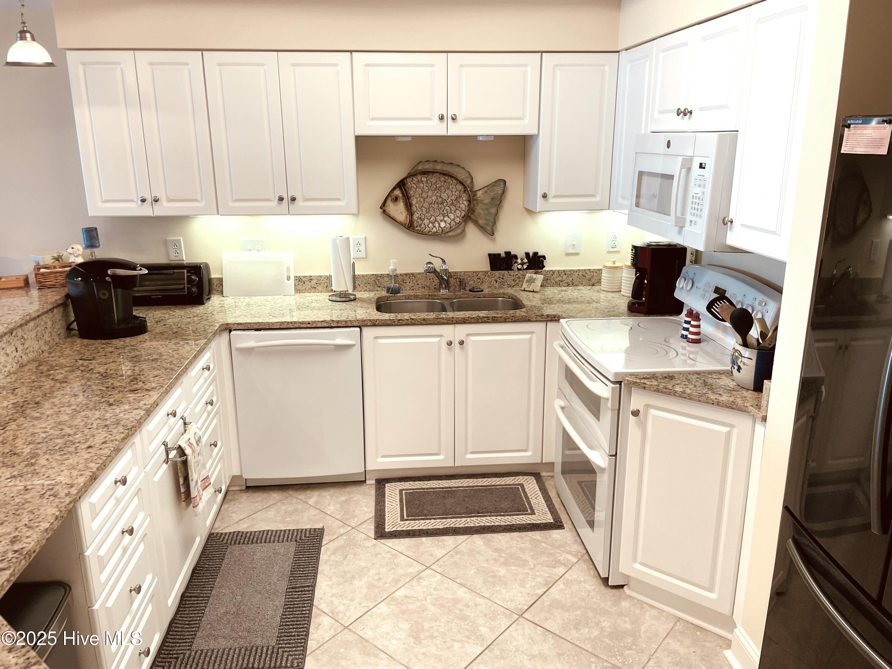 1550 Salter Path Road, Unit 209 Indian Beach, NC 28512 - Photo 21 of 43 KITCHEN