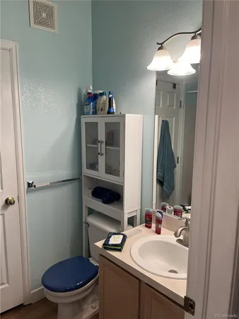 a view of a hallway with washer and dryer