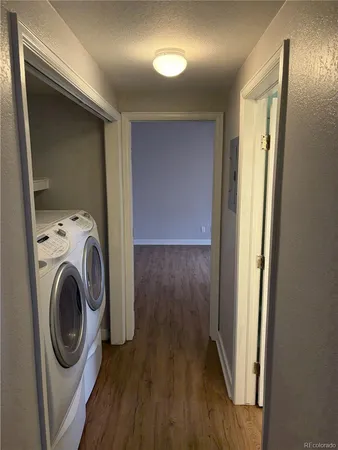 a bathroom with a sink toilet and a mirror