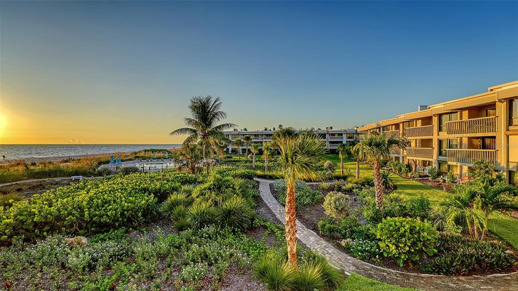 5757 Gulf Of Mexico Drive, Unit 204 Longboat Key, FL 34228 - Photo 1 of 71 a view of a garden